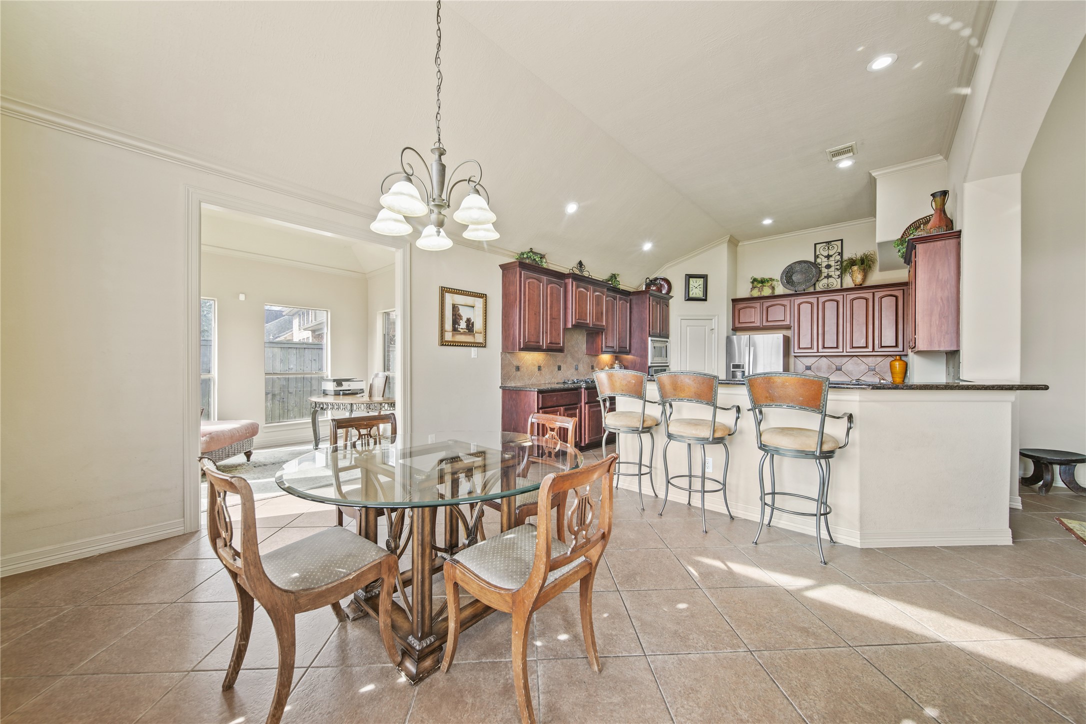 3414 Rue Orleans Missouri City, TX 77459 - Photo 25 of 46 a dining room with furniture and chandelier