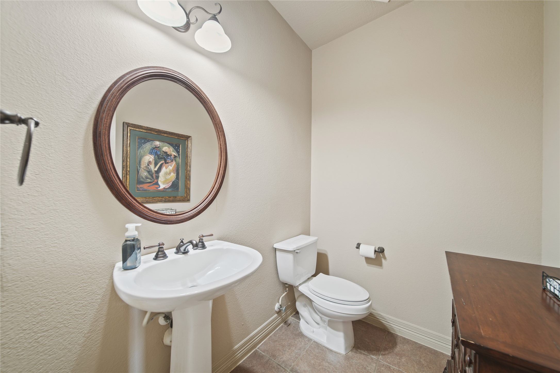 3414 Rue Orleans Missouri City, TX 77459 - Photo 27 of 46 a bathroom with a toilet a sink and a mirror