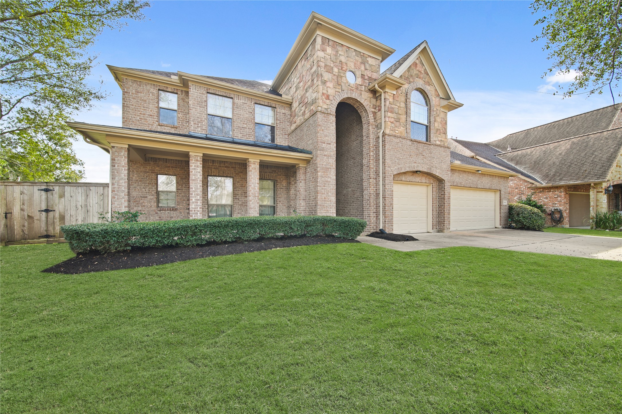 3414 Rue Orleans Missouri City, TX 77459 - Photo 3 of 46 a front view of a house with a garden