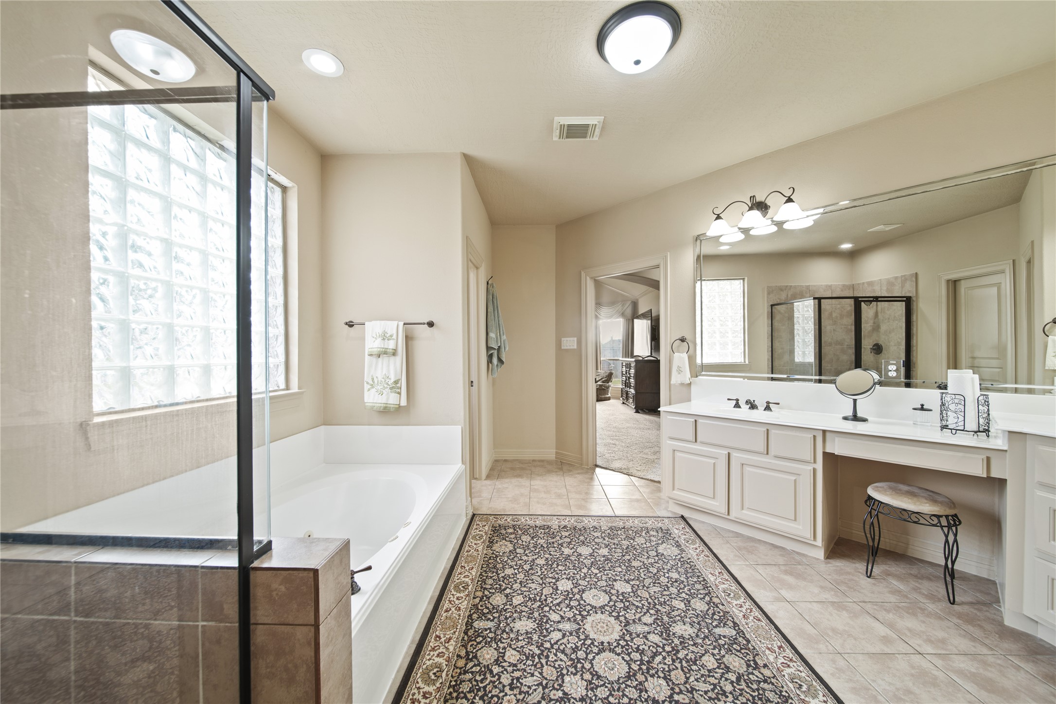 3414 Rue Orleans Missouri City, TX 77459 - Photo 31 of 46 a large spacious bathroom with a large tub shower and sink