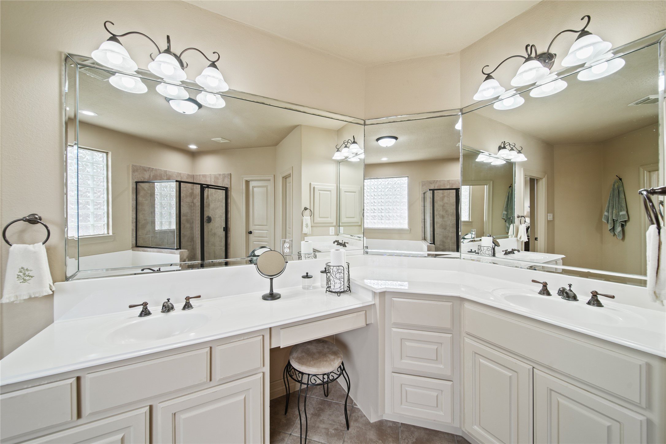 3414 Rue Orleans Missouri City, TX 77459 - Photo 32 of 46 a bathroom with a sink double vanity and a mirror