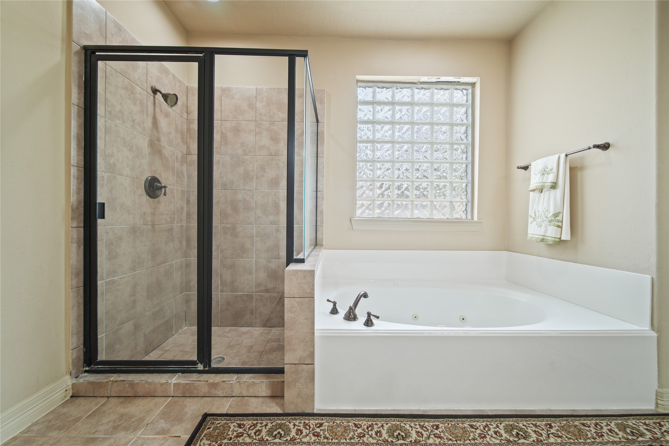 3414 Rue Orleans Missouri City, TX 77459 - Photo 33 of 46 a white bath tub sitting next to a shower