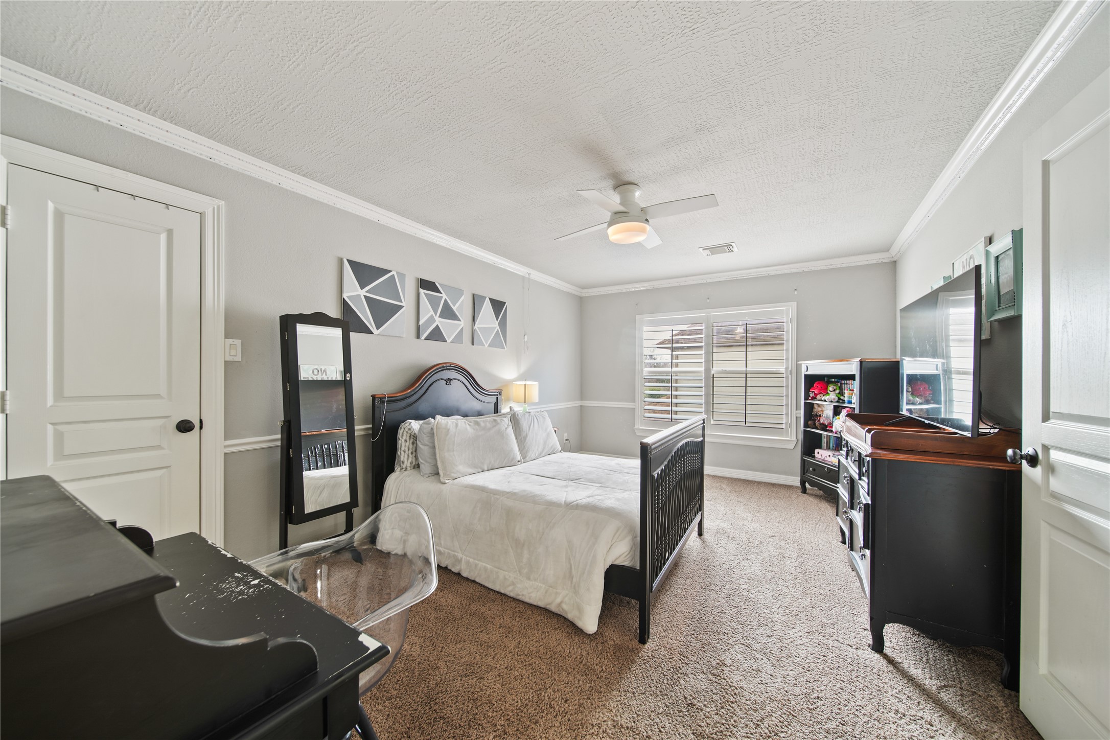 3414 Rue Orleans Missouri City, TX 77459 - Photo 35 of 46 a bedroom with a bed and furniture