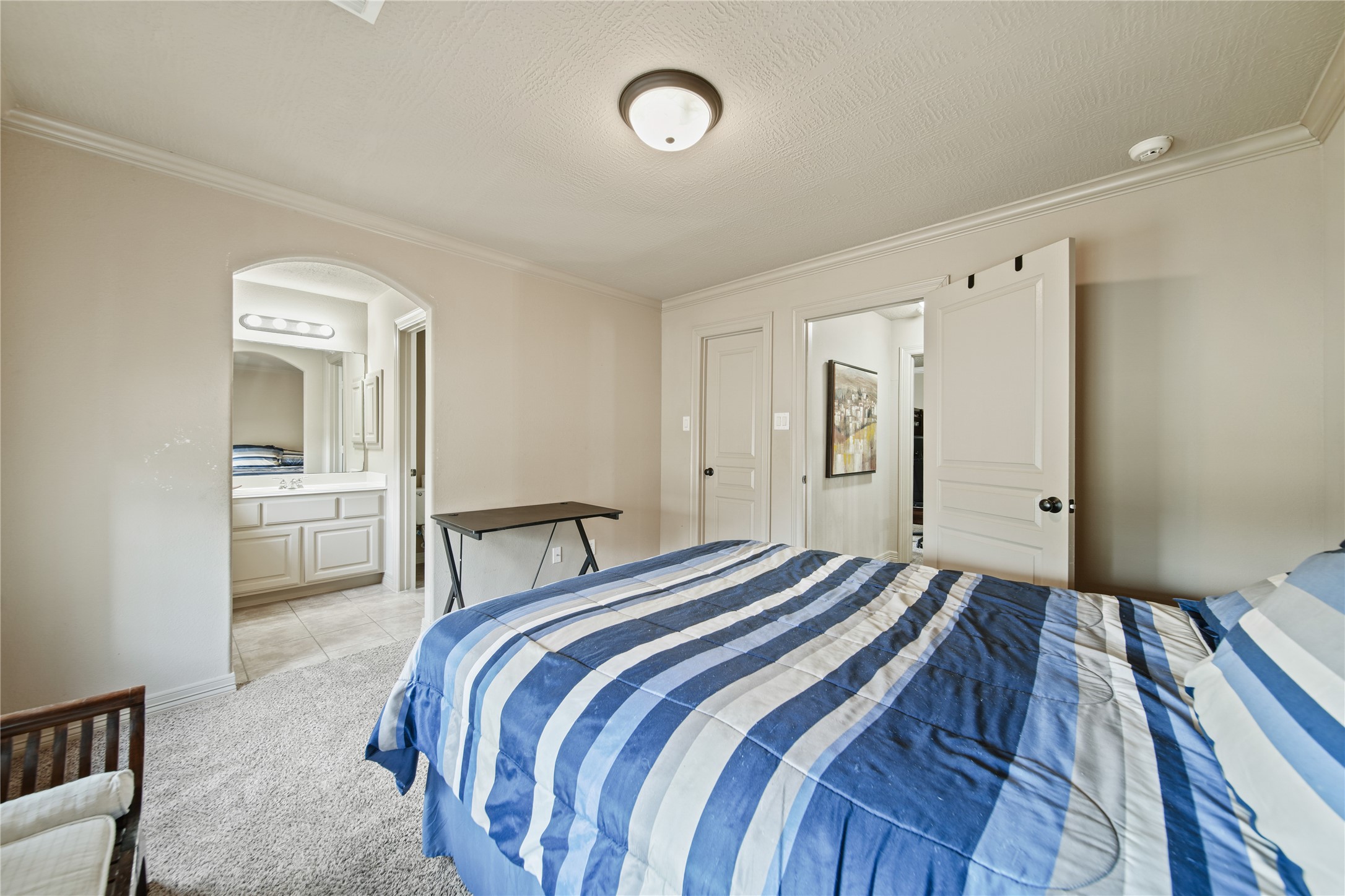 3414 Rue Orleans Missouri City, TX 77459 - Photo 38 of 46 a bedroom with a bed and a cabinets