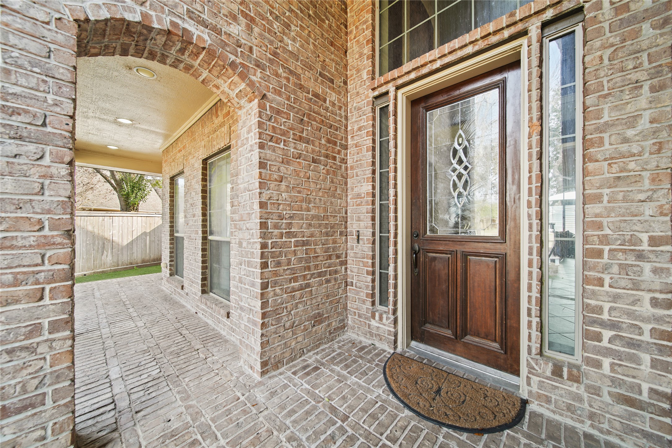 3414 Rue Orleans Missouri City, TX 77459 - Photo 4 of 46 a view of a wooden door with a glass door