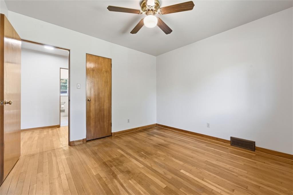 524 McElheny Road Glenshaw, PA 15116 - Photo 20 of 41 a view of empty room with wooden floor