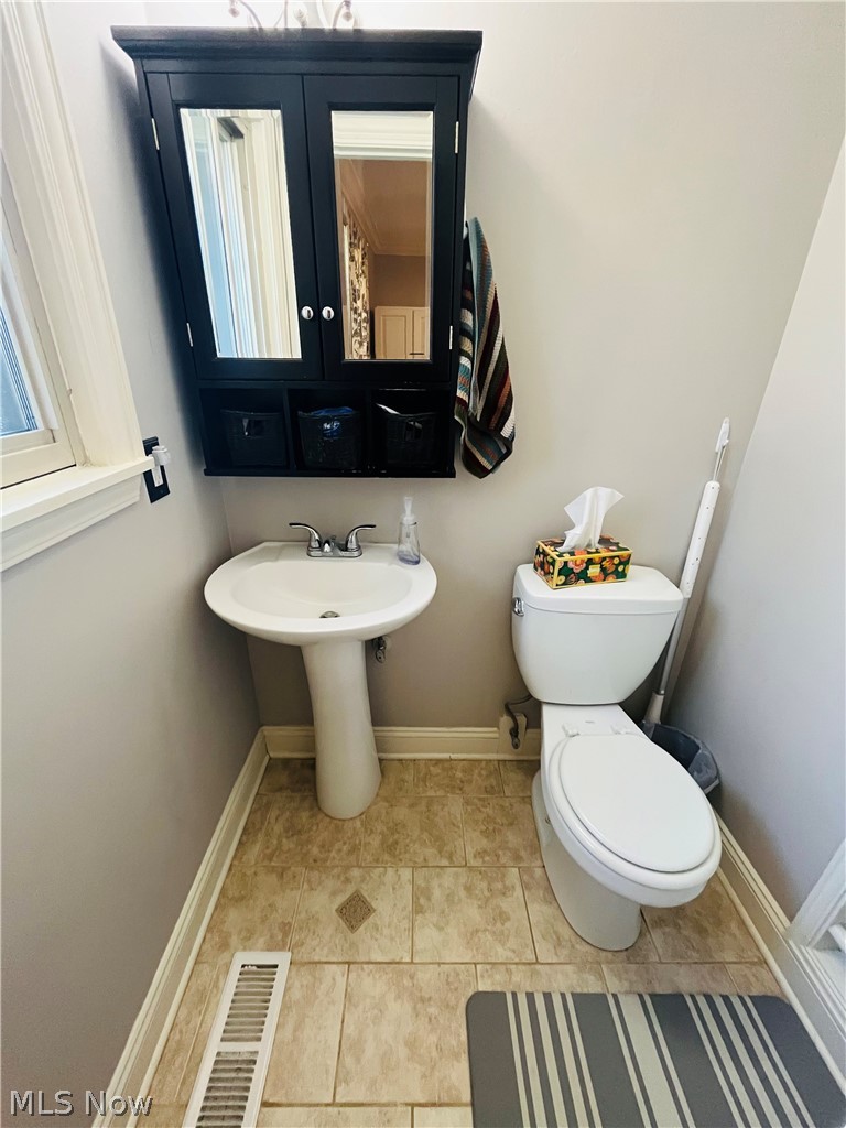 6871 Byron Road Madison, OH 44057 - Photo 40 of 48 Bathroom featuring tile flooring and toilet