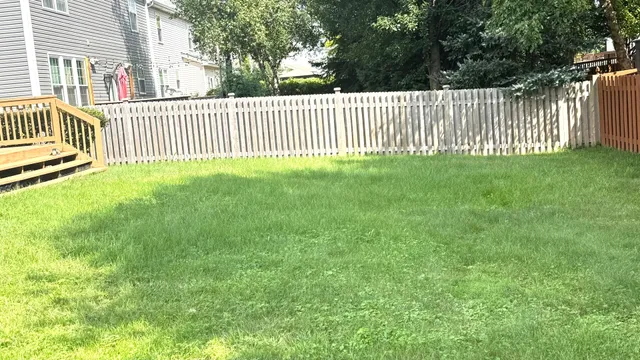 a view of a house with a small yard