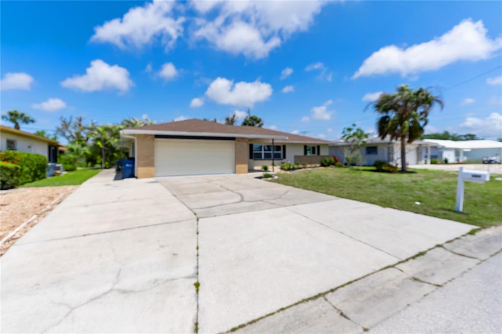 609 Glen Oak Road Venice, FL 34293 - Photo 1 of 1 a view of a house with a yard