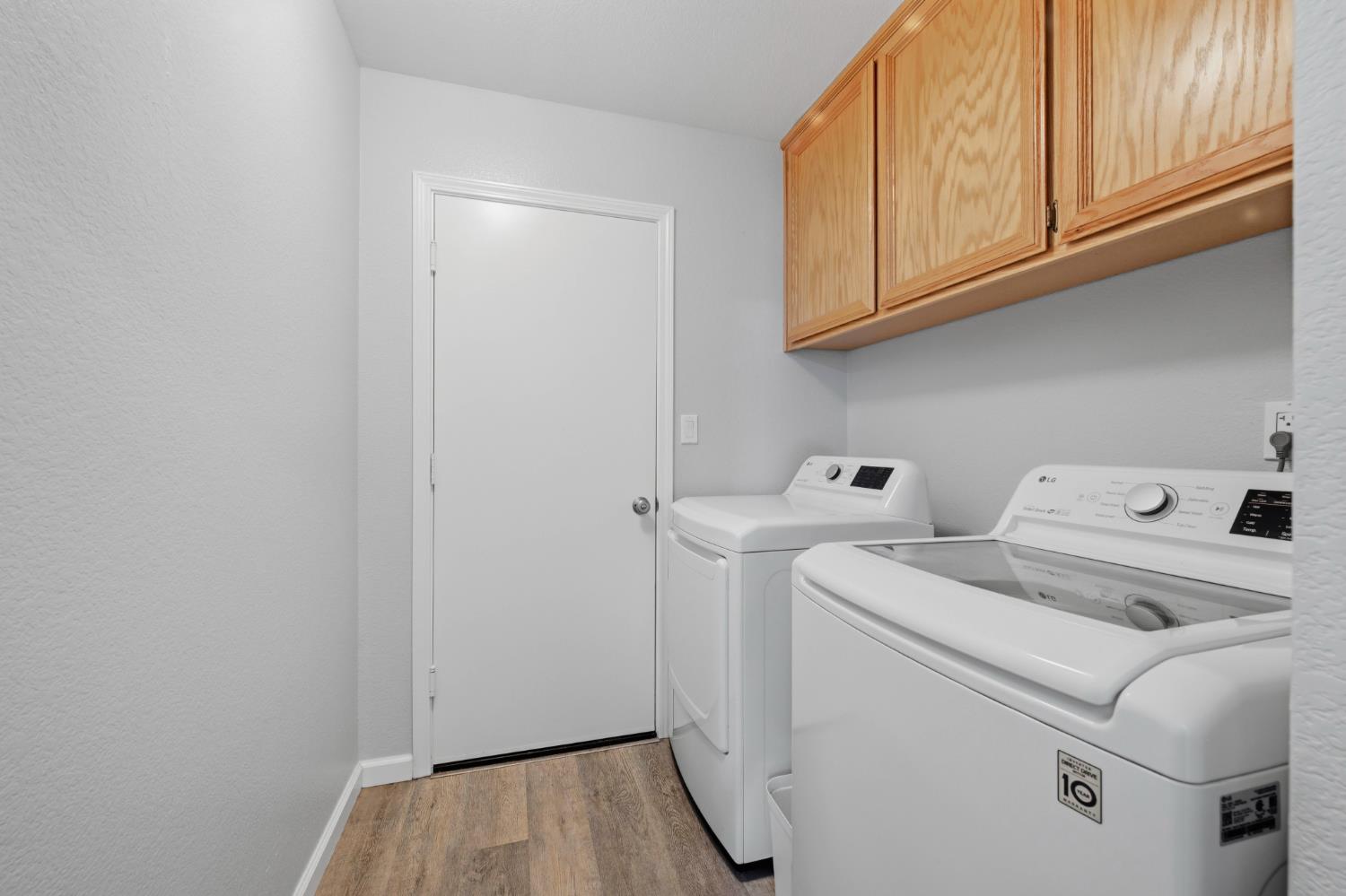 5013 Charter Road Rocklin, CA 95765 - Photo 26 of 35 a view of storage and utility room with washer and dryer