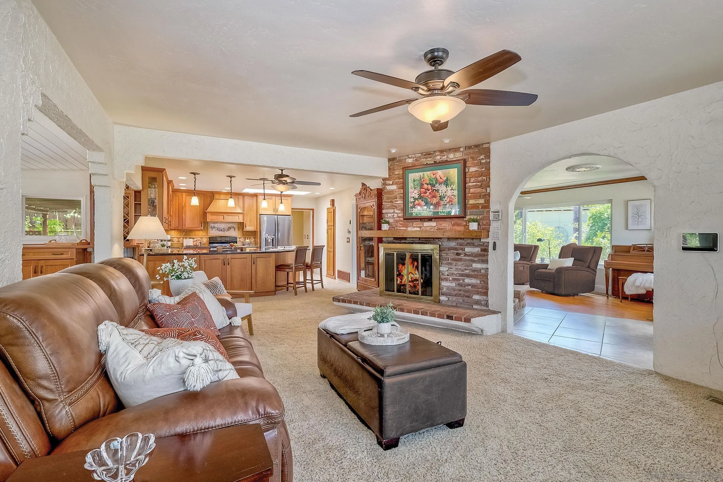 1996 Valley Rim Road El Cajon, CA 92019 - Photo 12 of 74 a living room with furniture and a fireplace