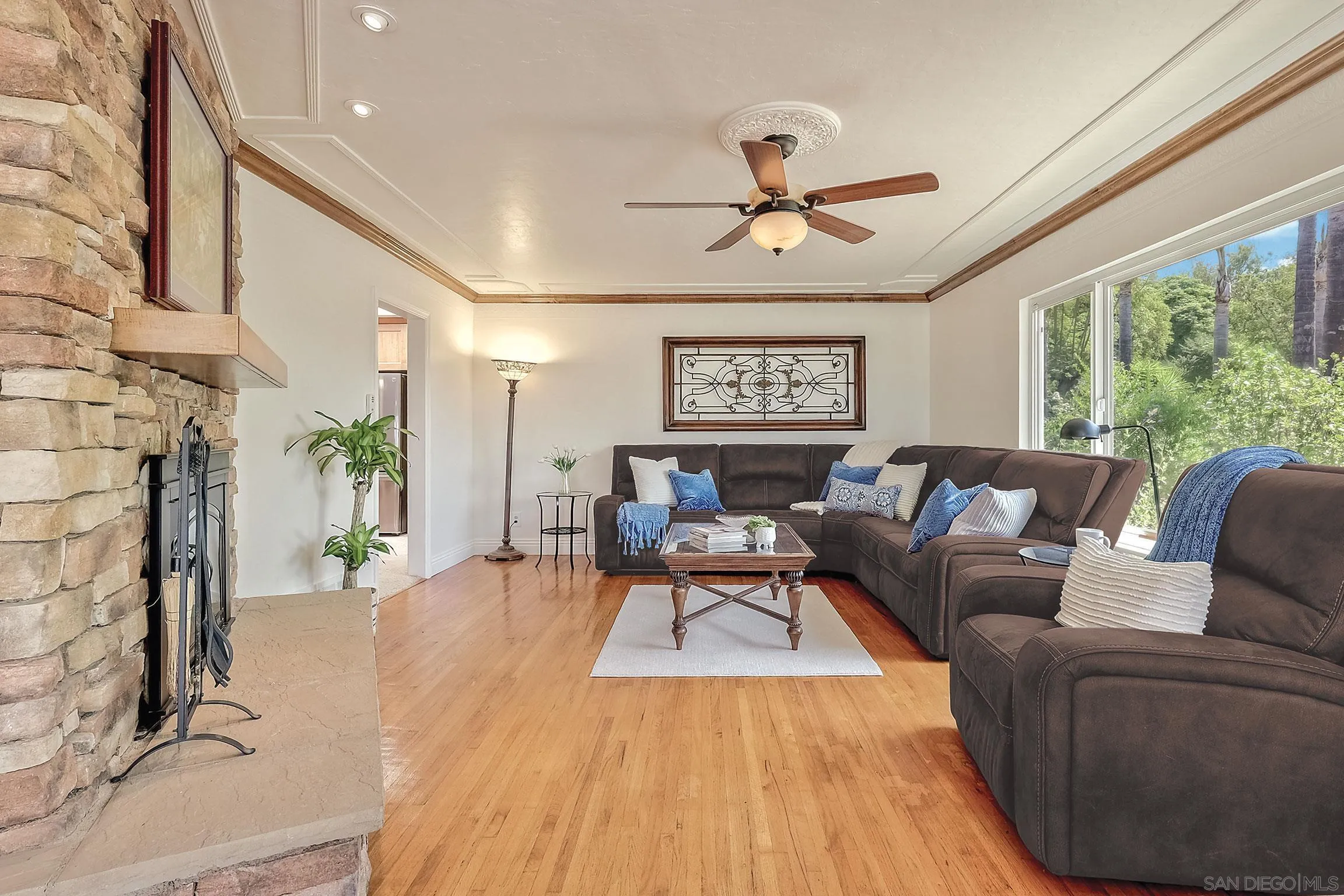 1996 Valley Rim Road El Cajon, CA 92019 - Photo 13 of 74 a living room with furniture and a fireplace