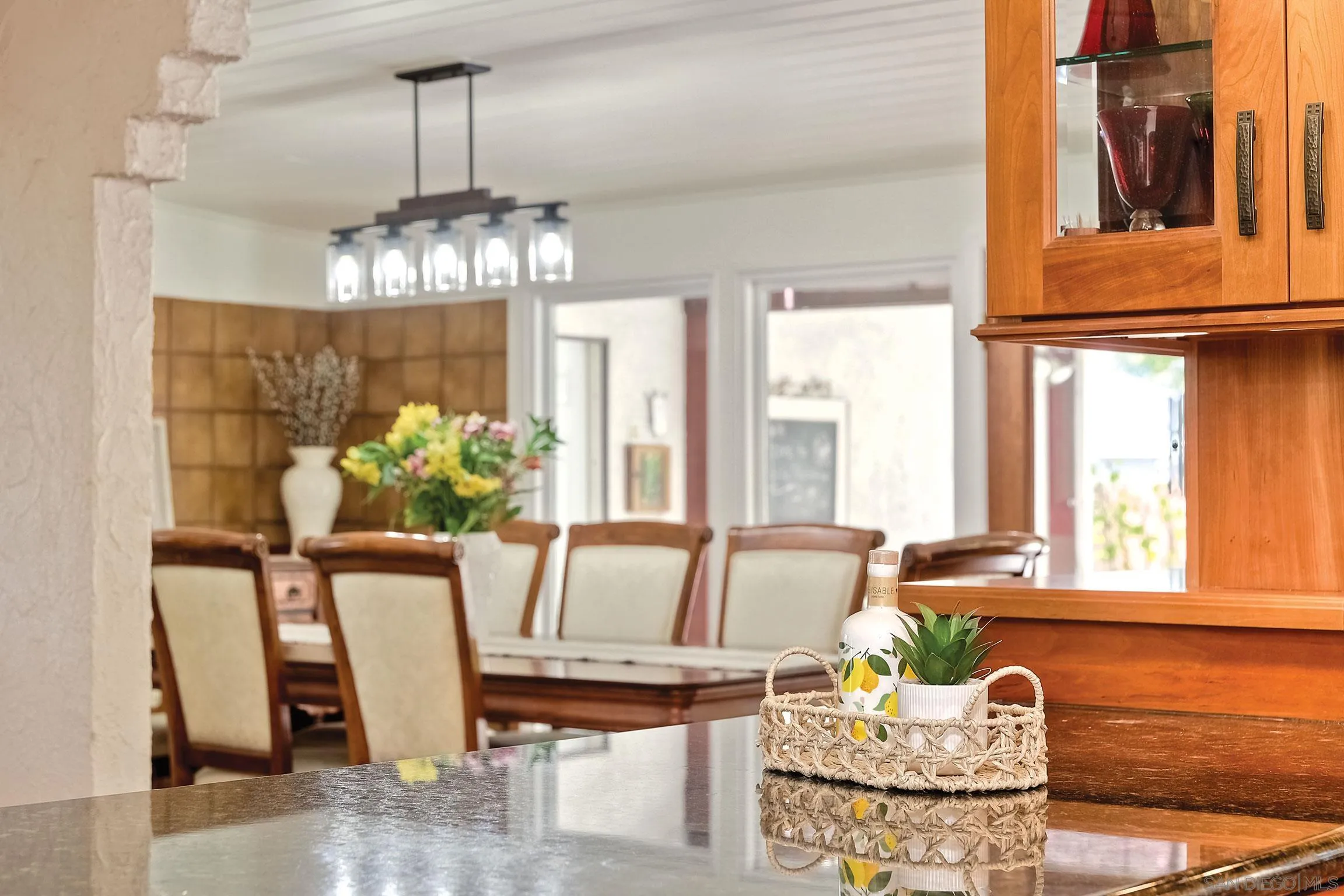 1996 Valley Rim Road El Cajon, CA 92019 - Photo 15 of 74 a view of a dining room with furniture window and wooden floor