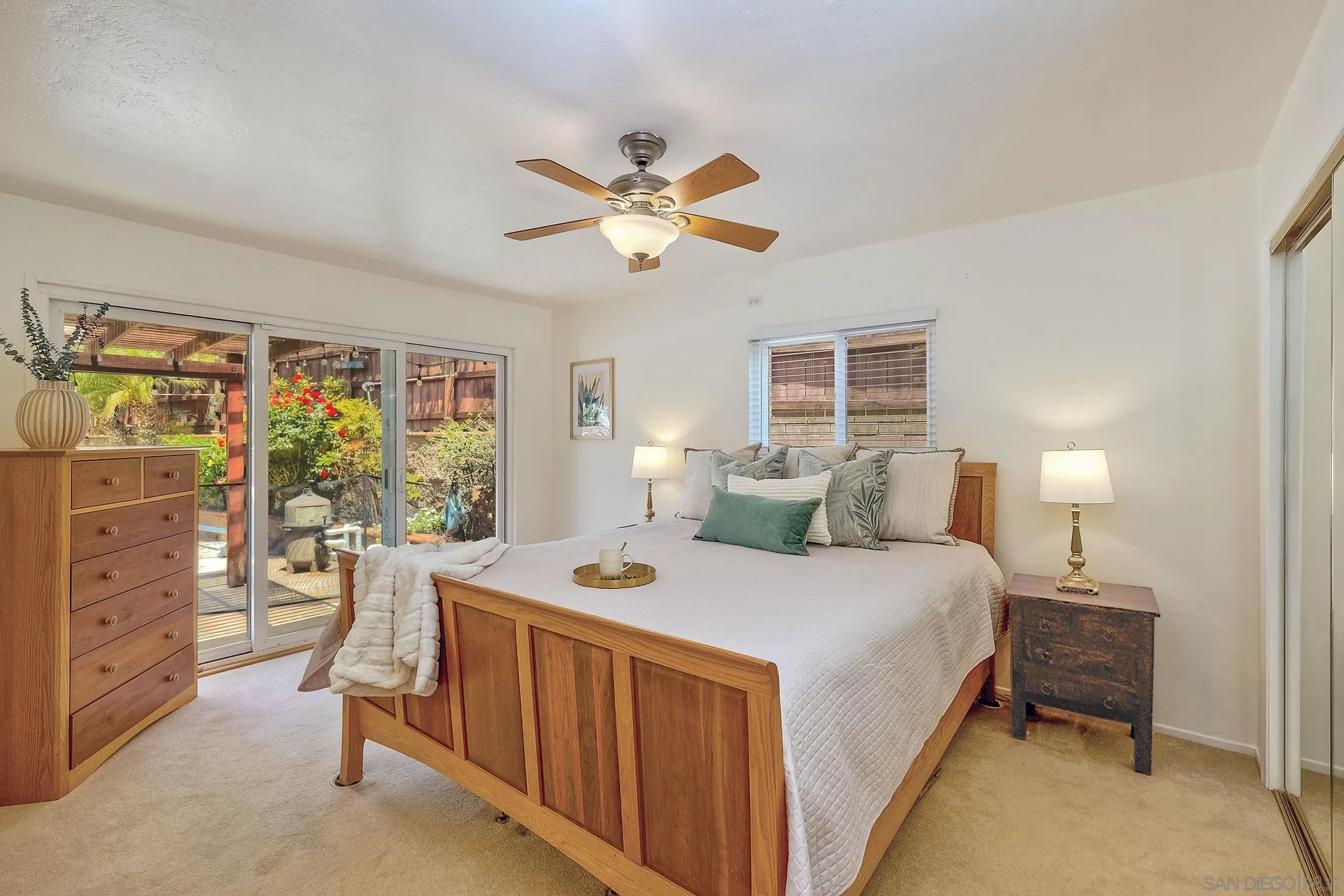 1996 Valley Rim Road El Cajon, CA 92019 - Photo 17 of 74 a bedroom with a bed and a table in it