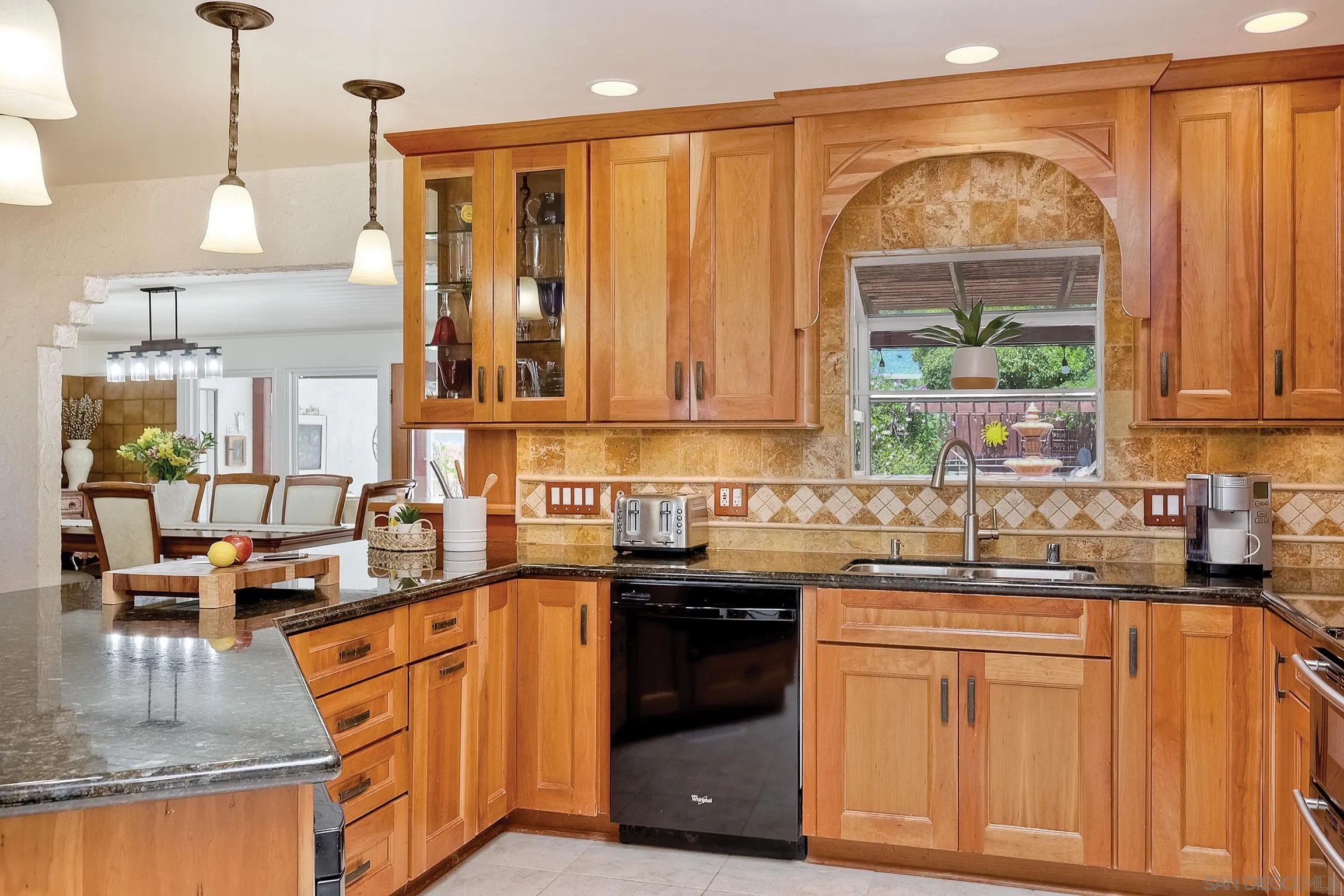 1996 Valley Rim Road El Cajon, CA 92019 - Photo 21 of 74 a kitchen with stainless steel appliances granite countertop a sink a stove and a cabinets