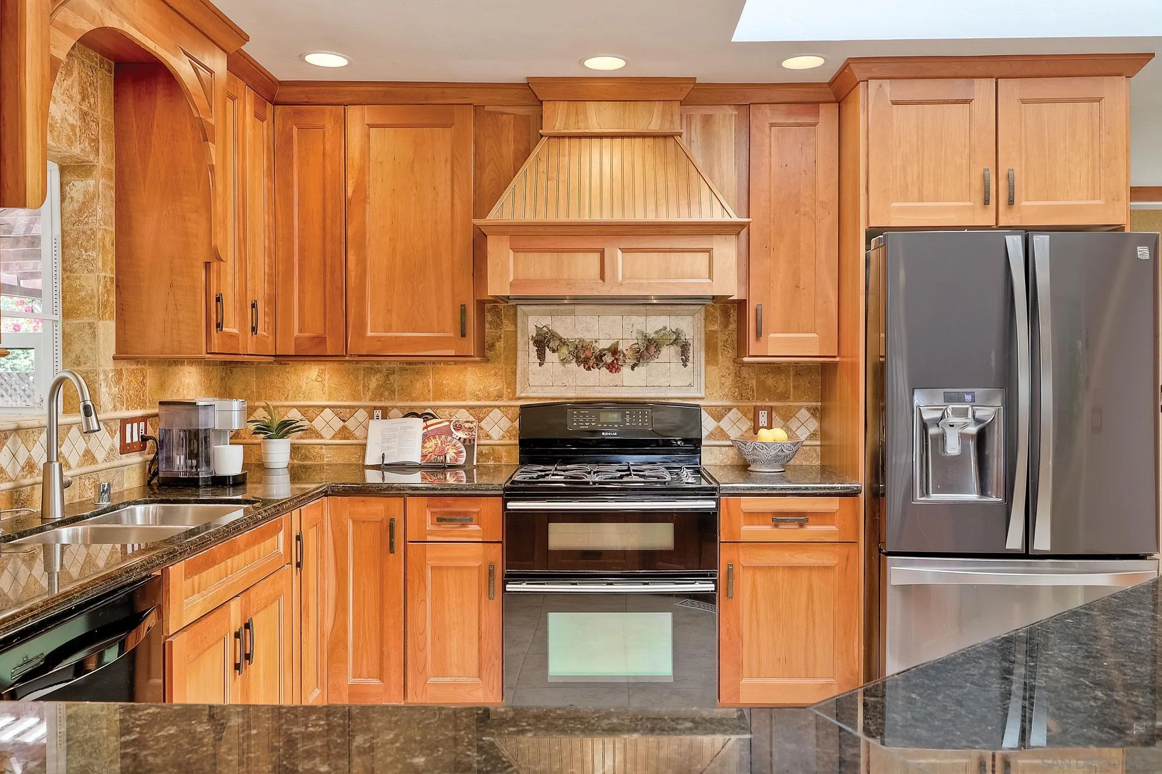 1996 Valley Rim Road El Cajon, CA 92019 - Photo 24 of 74 a kitchen with stainless steel appliances granite countertop a refrigerator a stove and a sink