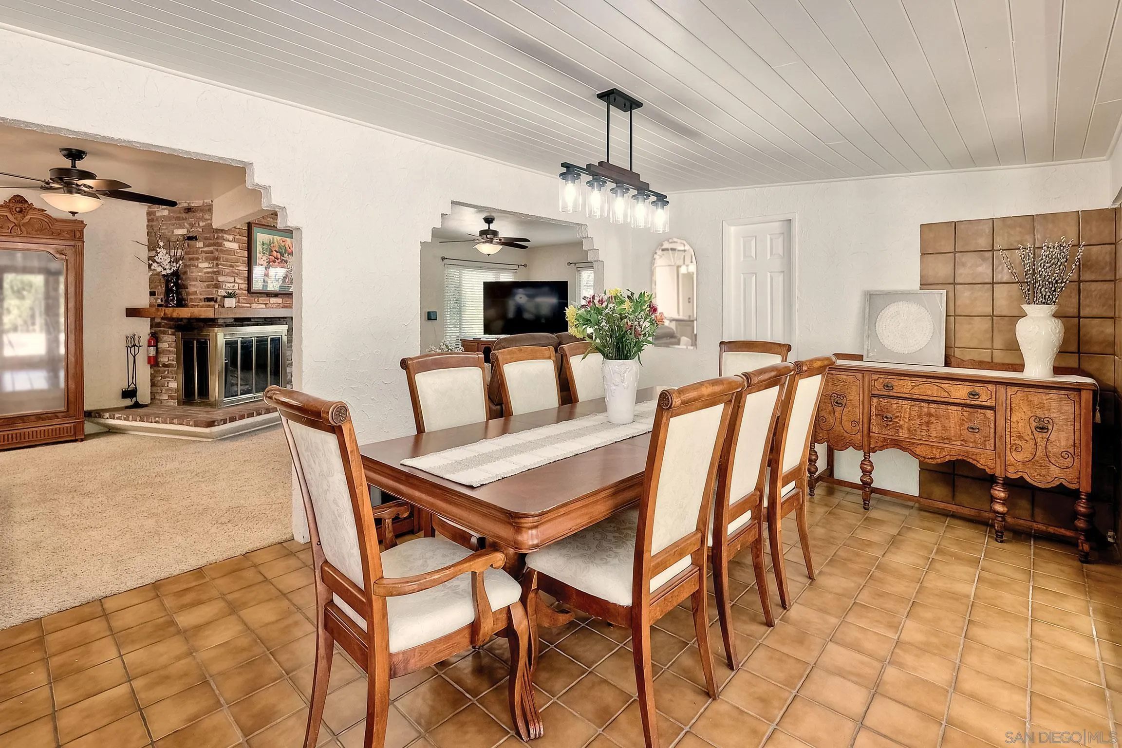 1996 Valley Rim Road El Cajon, CA 92019 - Photo 36 of 74 a view of a dining room with furniture and a chandelier