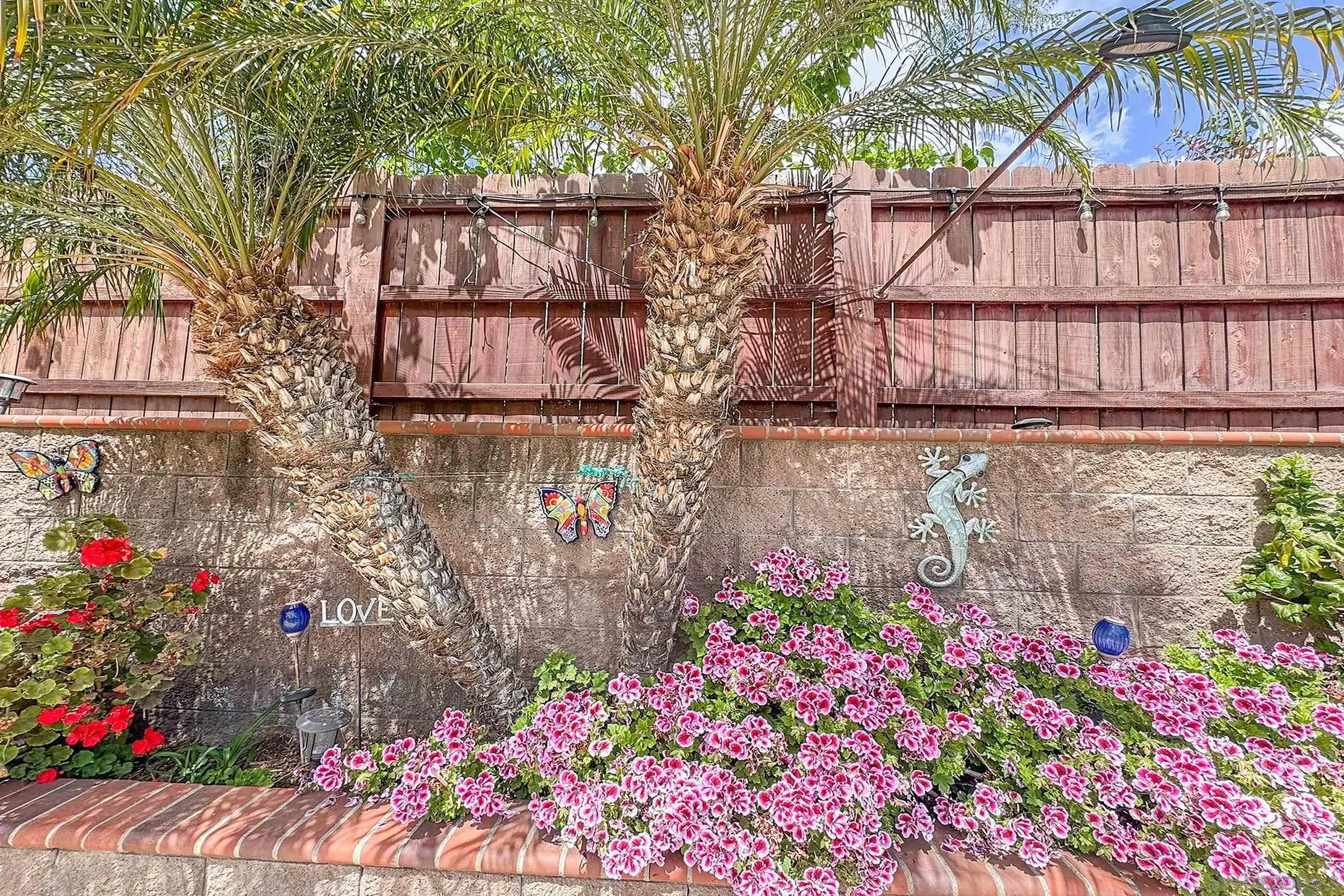 1996 Valley Rim Road El Cajon, CA 92019 - Photo 45 of 74 a view of a pathway with a flower garden