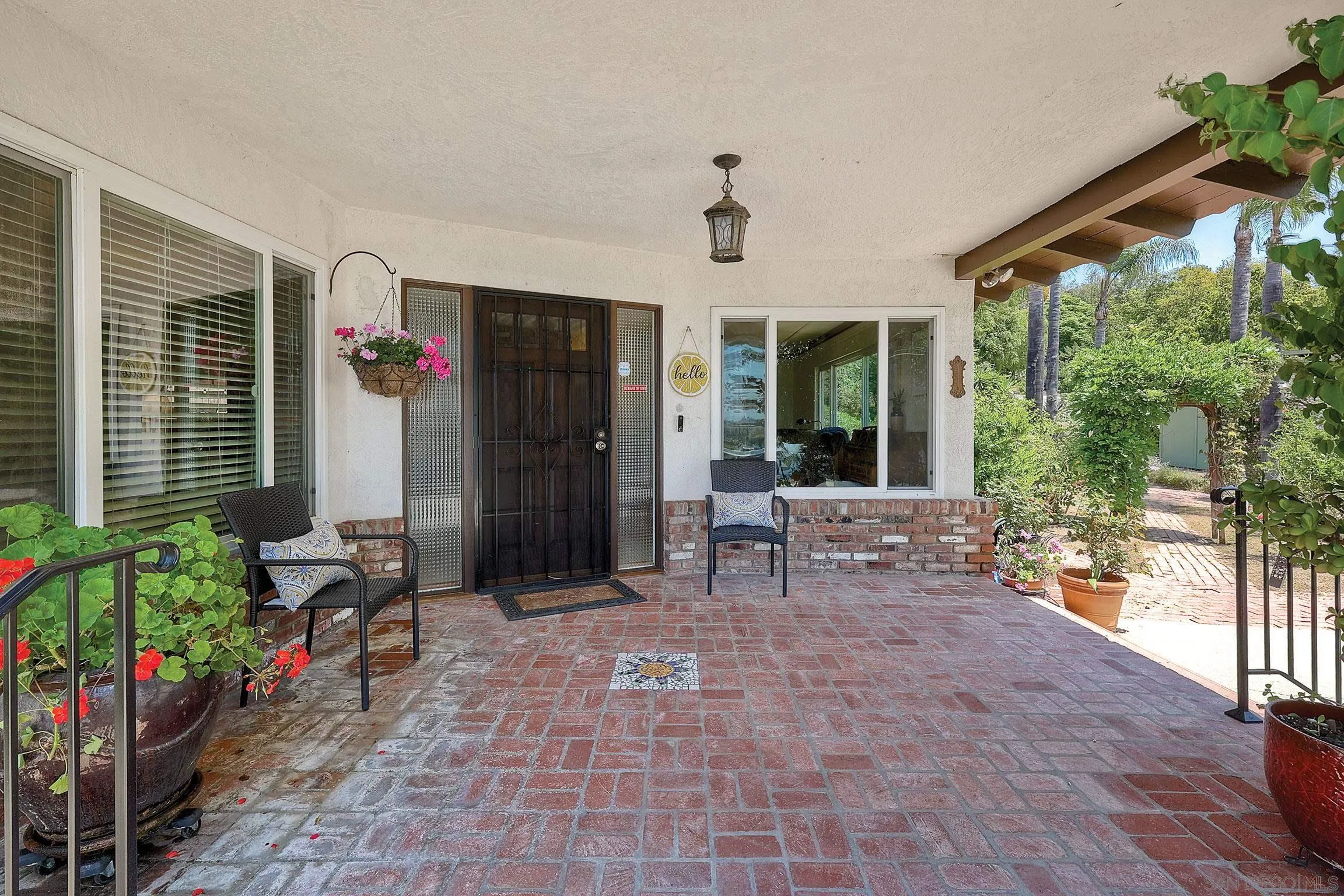 1996 Valley Rim Road El Cajon, CA 92019 - Photo 68 of 74 a living room filled with furniture and a potted plant