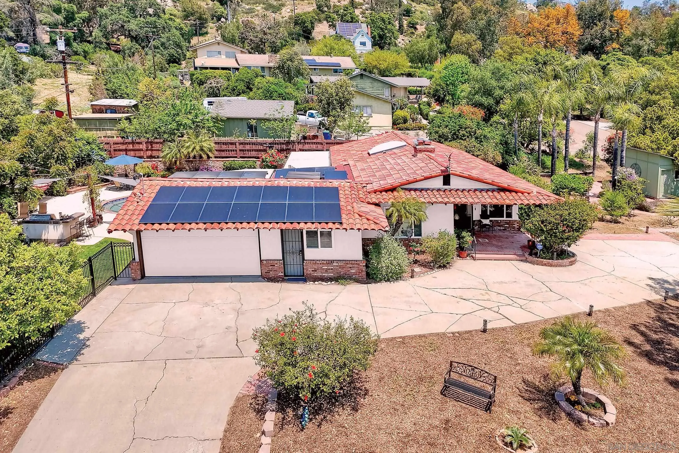 1996 Valley Rim Road El Cajon, CA 92019 - Photo 70 of 74 a view of a house with a yard and sitting area