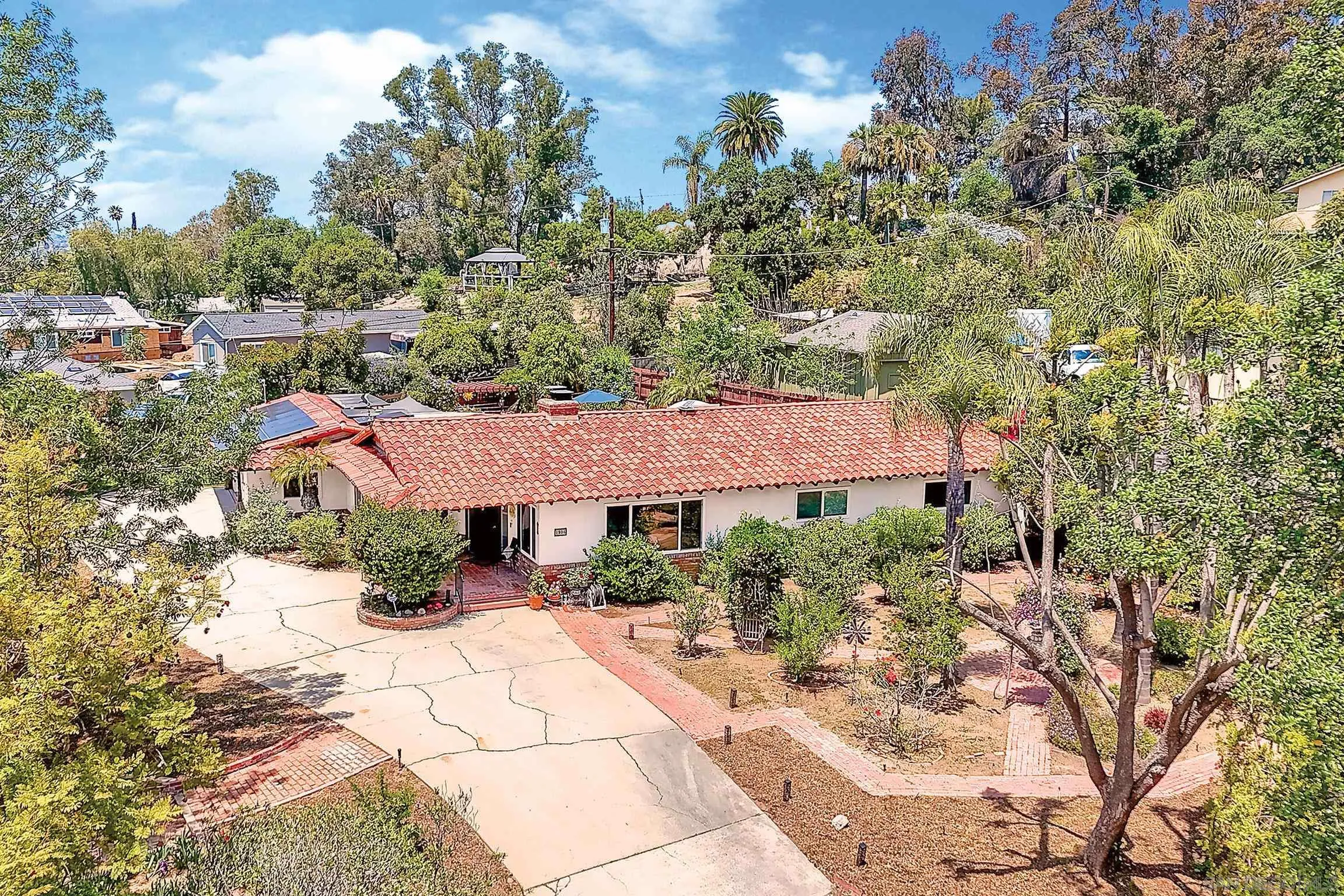 1996 Valley Rim Road El Cajon, CA 92019 - Photo 9 of 74 a view of house and garden with trees