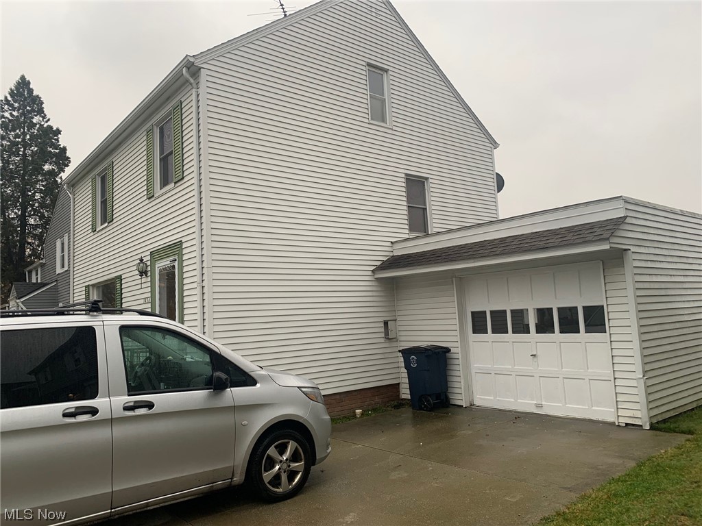 1456 Evanston Road Lyndhurst, OH 44124 - Photo 2 of 32 View of property exterior featuring a garage