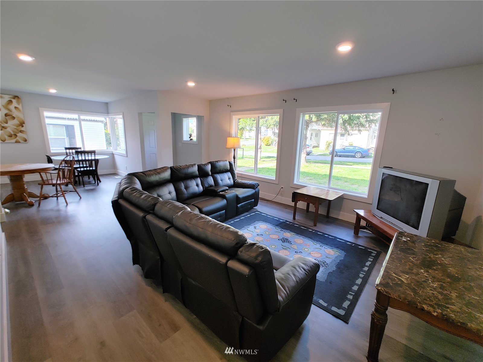 3506 Rockefeller Avenue Everett, WA 98201 - Photo 11 of 27 a living room with furniture and a flat screen tv