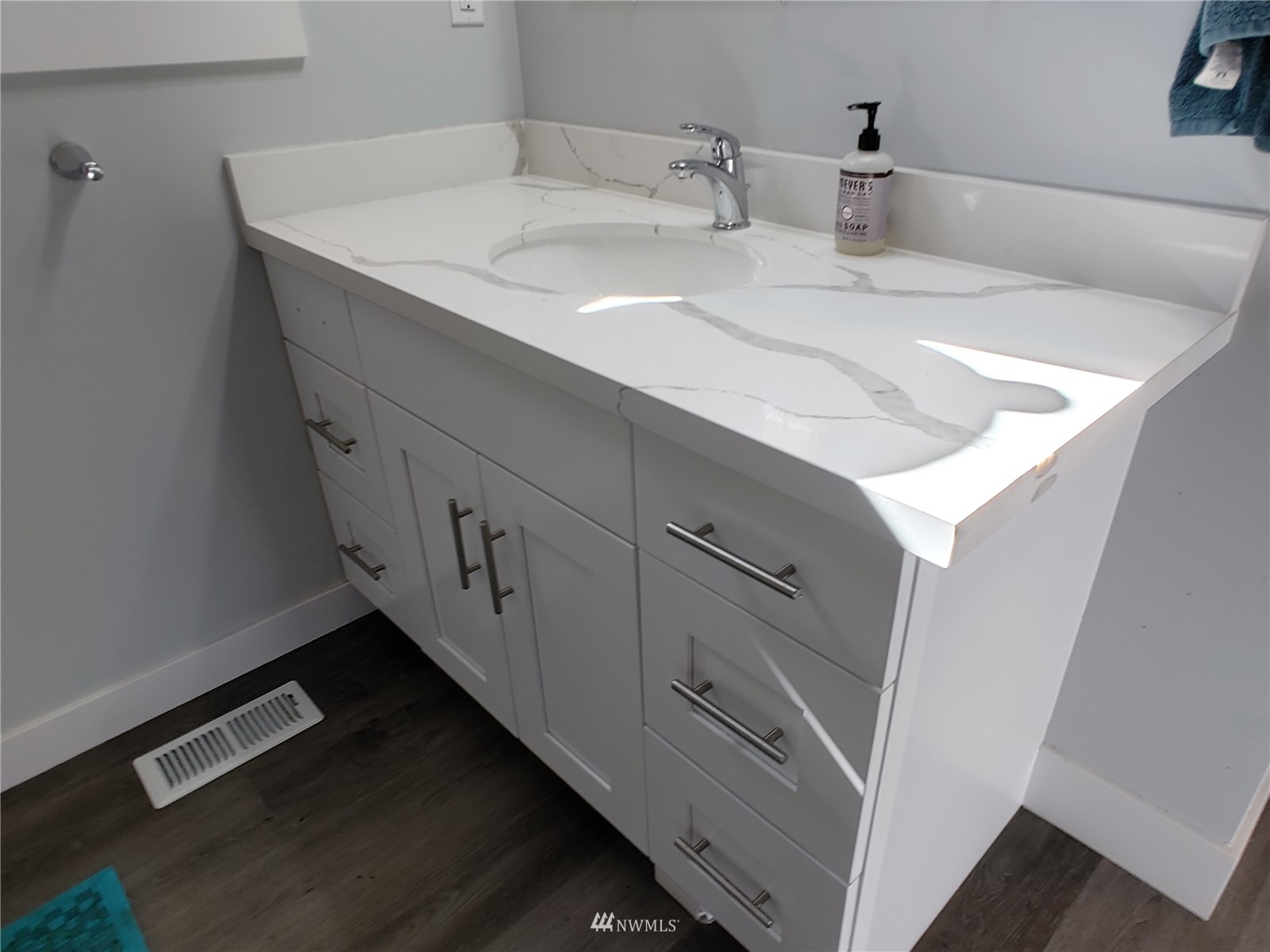 3506 Rockefeller Avenue Everett, WA 98201 - Photo 17 of 27 a bathroom with a sink and a mirror