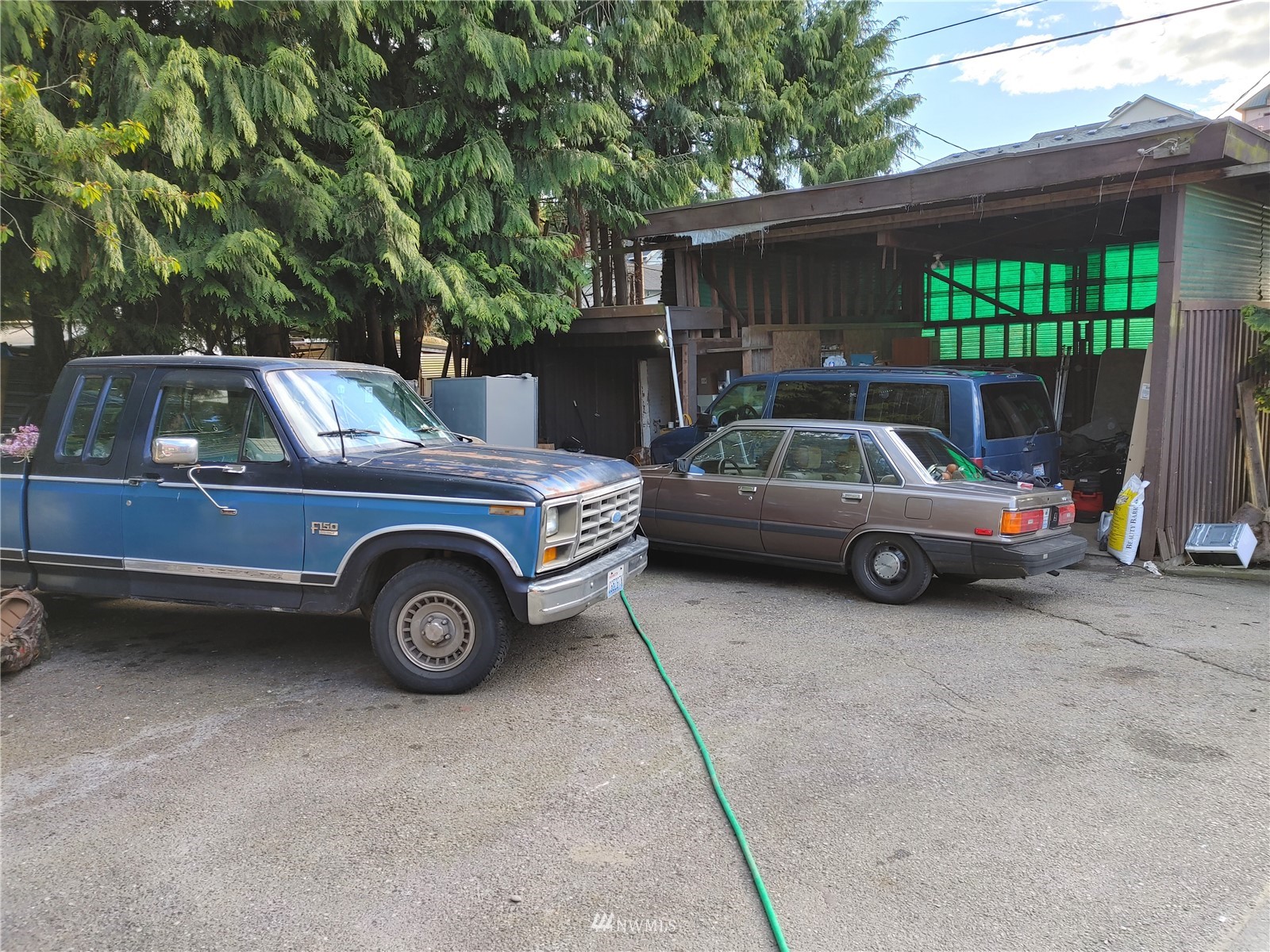 3506 Rockefeller Avenue Everett, WA 98201 - Photo 26 of 27 a car parked in front of a house