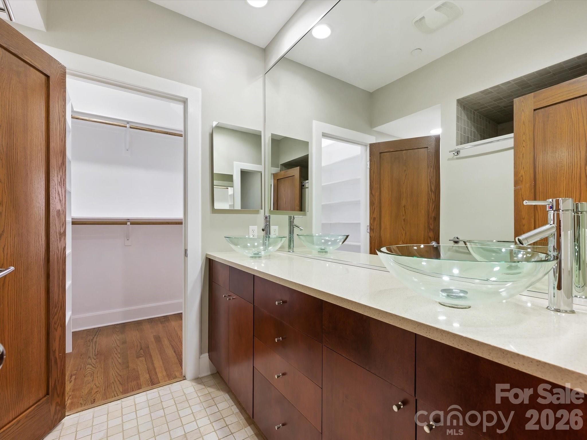 420 Queens Road Charlotte, NC 28207 - Photo 24 of 35 a bathroom with a sink and a mirror
