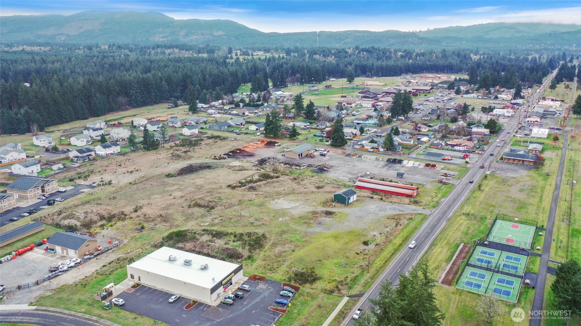 309 Binghampton Street Rainier, WA 98576 - Photo 4 of 11 a view of a lake in middle of the town