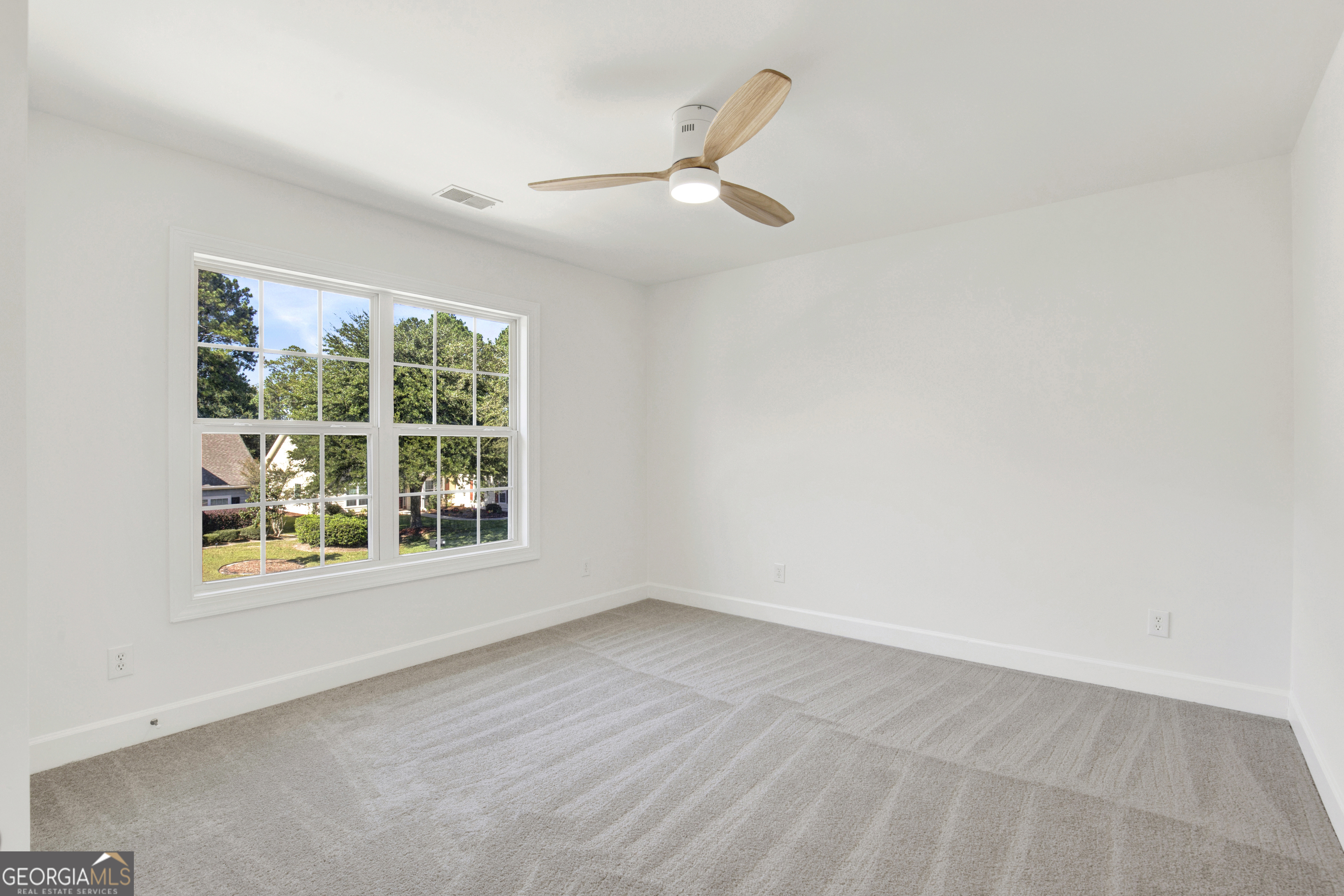 18 Stone Gate Court Pooler, GA 31322 - Photo 14 of 32 an empty room with a window