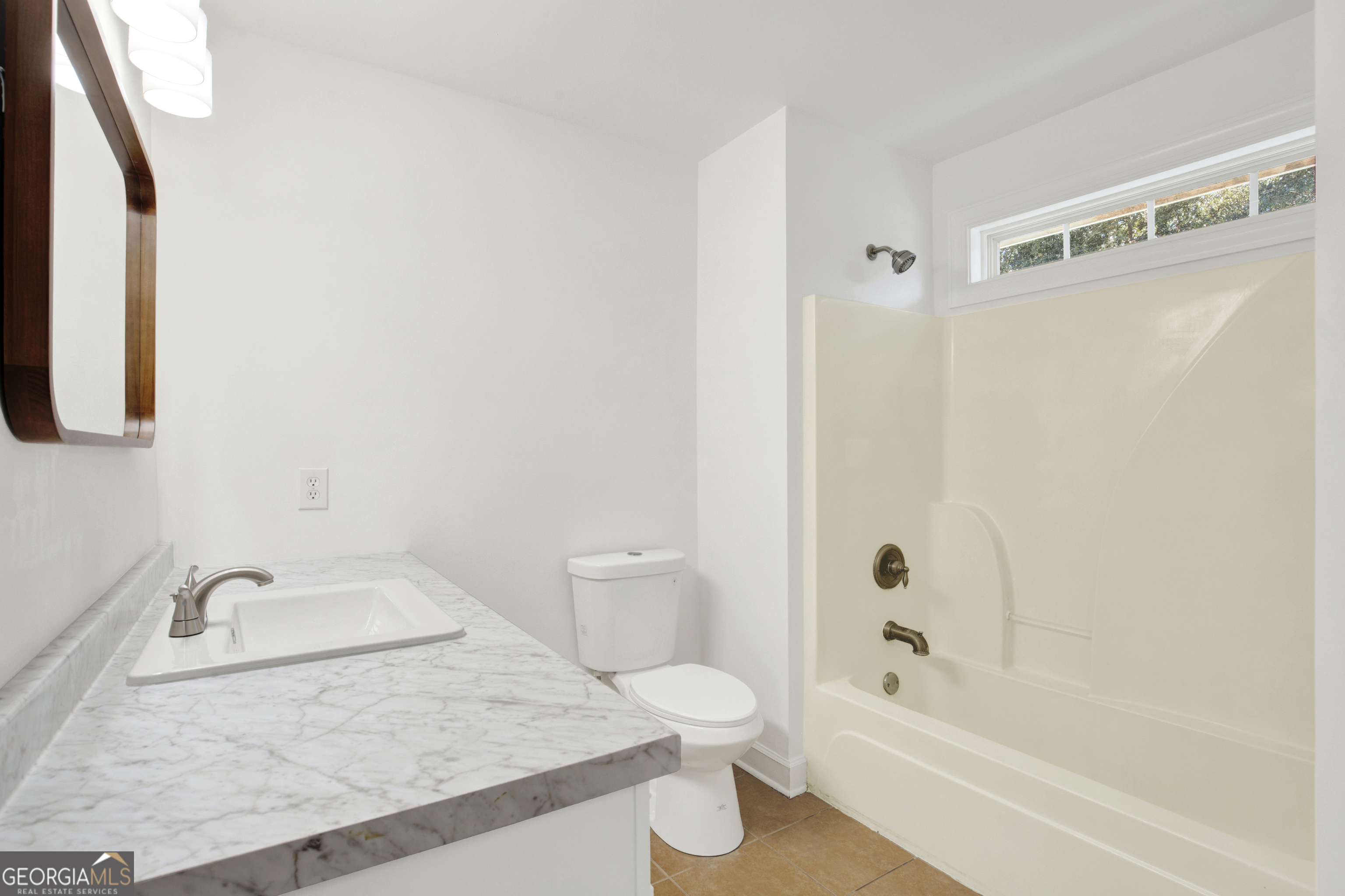 18 Stone Gate Court Pooler, GA 31322 - Photo 18 of 32 a bathroom with a sink a toilet and a bathtub