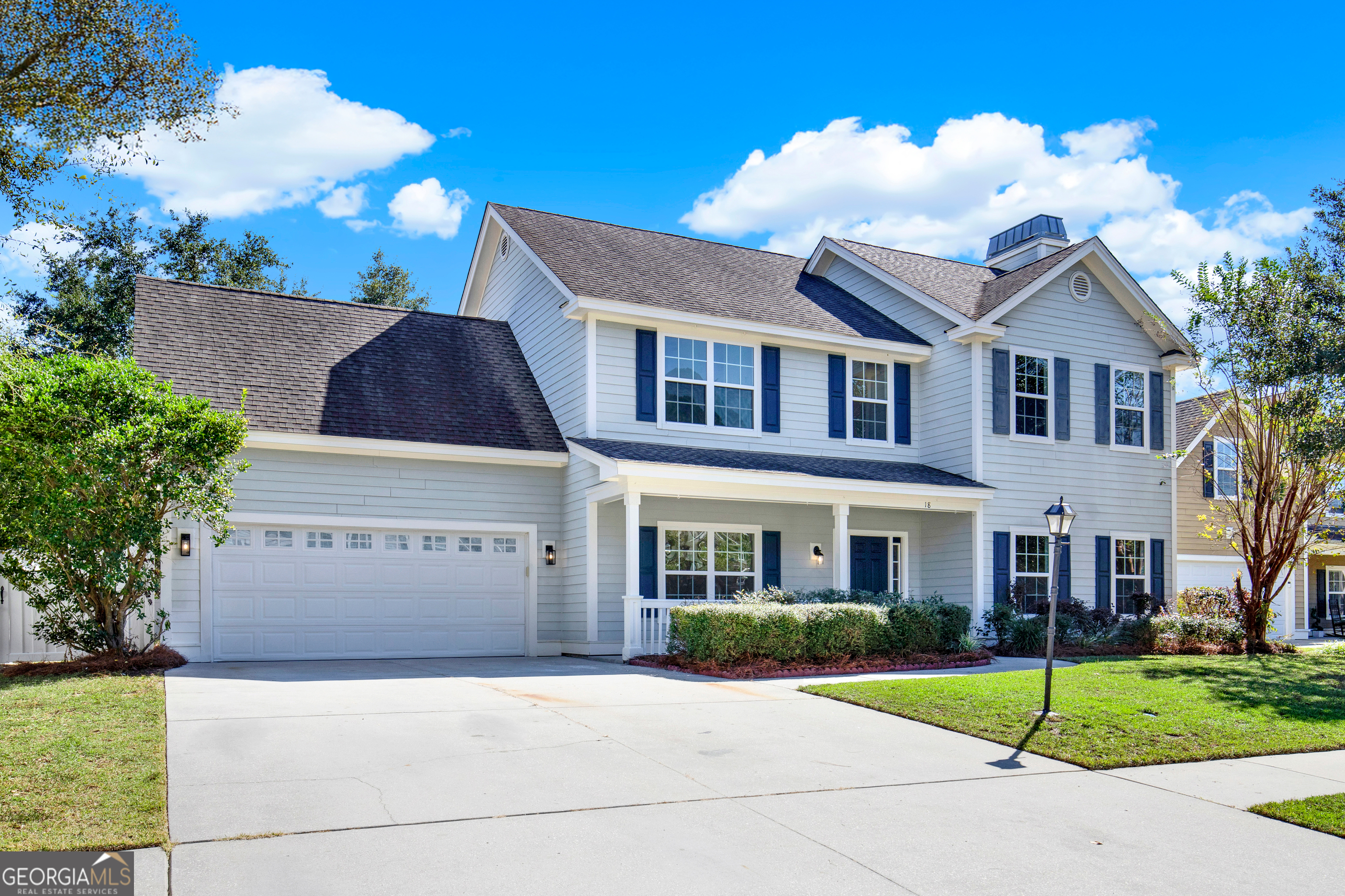 18 Stone Gate Court Pooler, GA 31322 - Photo 2 of 32 a front view of a house with a garden