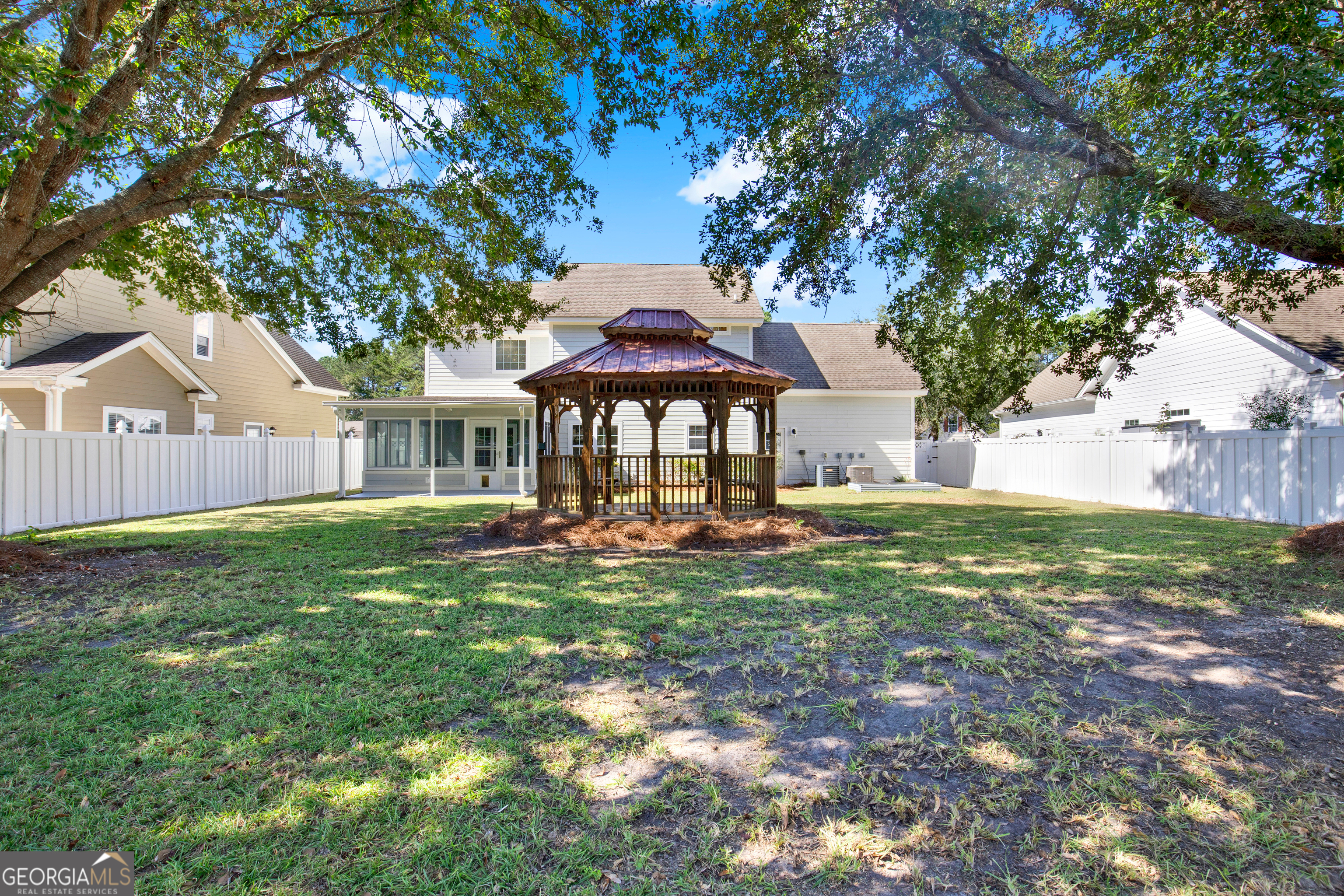 18 Stone Gate Court Pooler, GA 31322 - Photo 24 of 32 a view of a house with backyard and sitting area