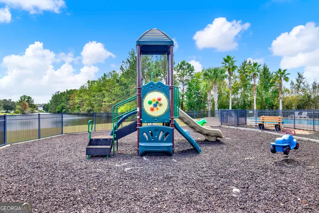 a view of a house with a swimming pool