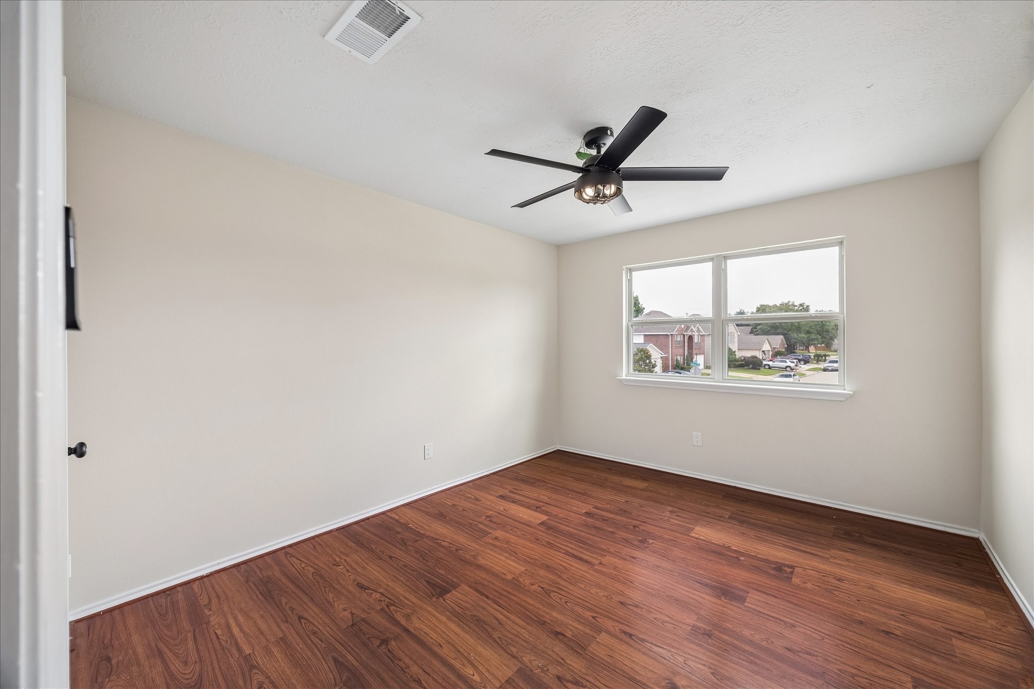 10411 Goodrum Road Houston, TX 77041 - Photo 19 of 25 Secondary bedrooms also offers laminate flooring, no carpet anywhere in the house