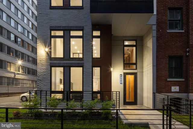 a front view of a building with street view