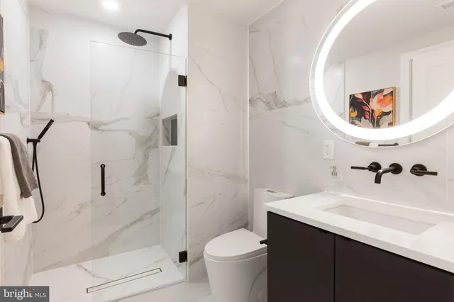 a view of a kitchen with washer and dryer