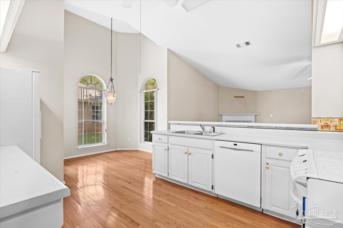 3485 Ashmore Lane Pace, FL 32571 - Photo 19 of 49 a spacious bathroom with a granite countertop sink and a mirror