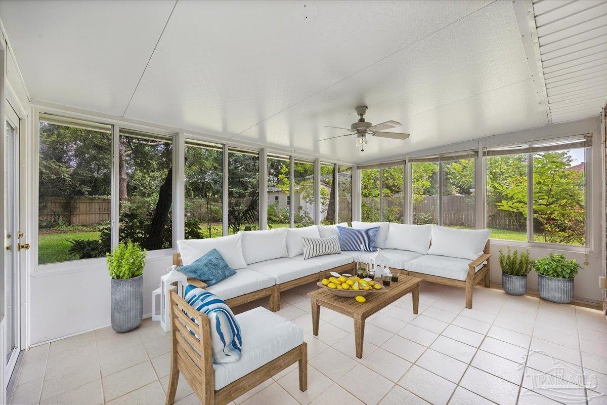 3485 Ashmore Lane Pace, FL 32571 - Photo 21 of 49 a living room with furniture and a large window