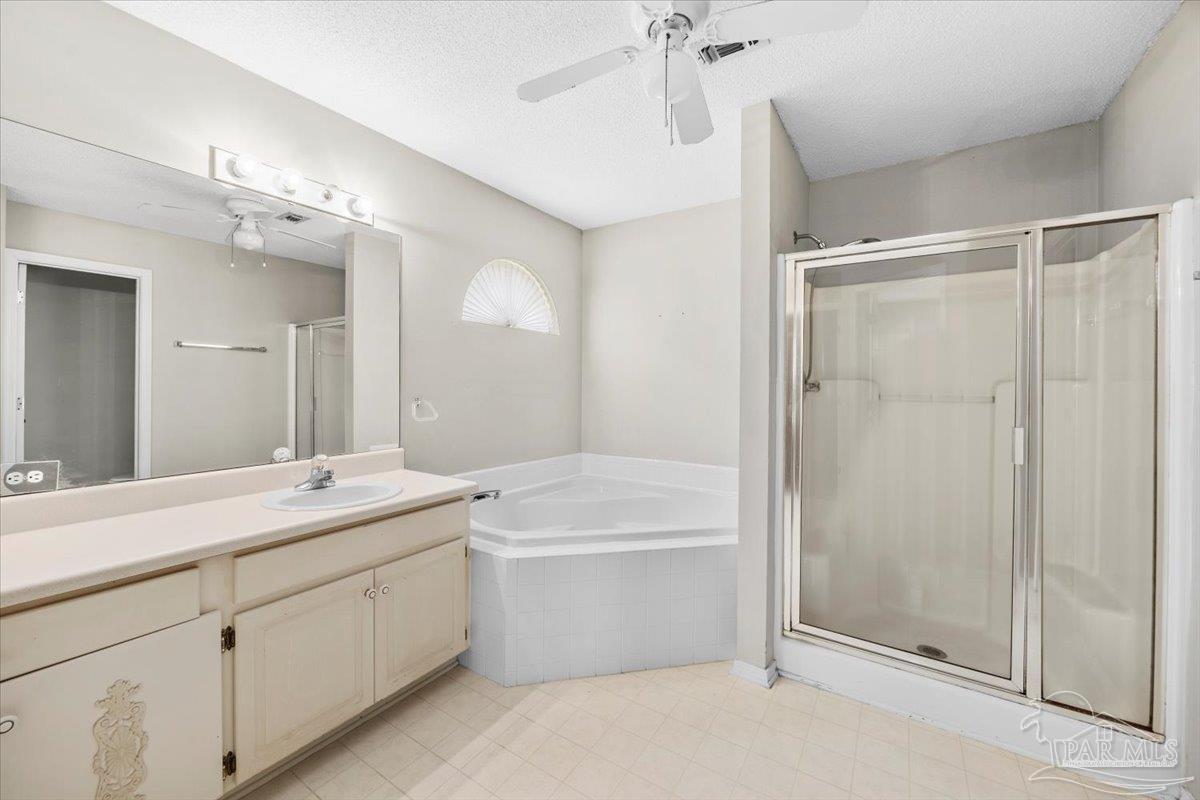 3485 Ashmore Lane Pace, FL 32571 - Photo 32 of 49 a bathroom with a sink a toilet and shower