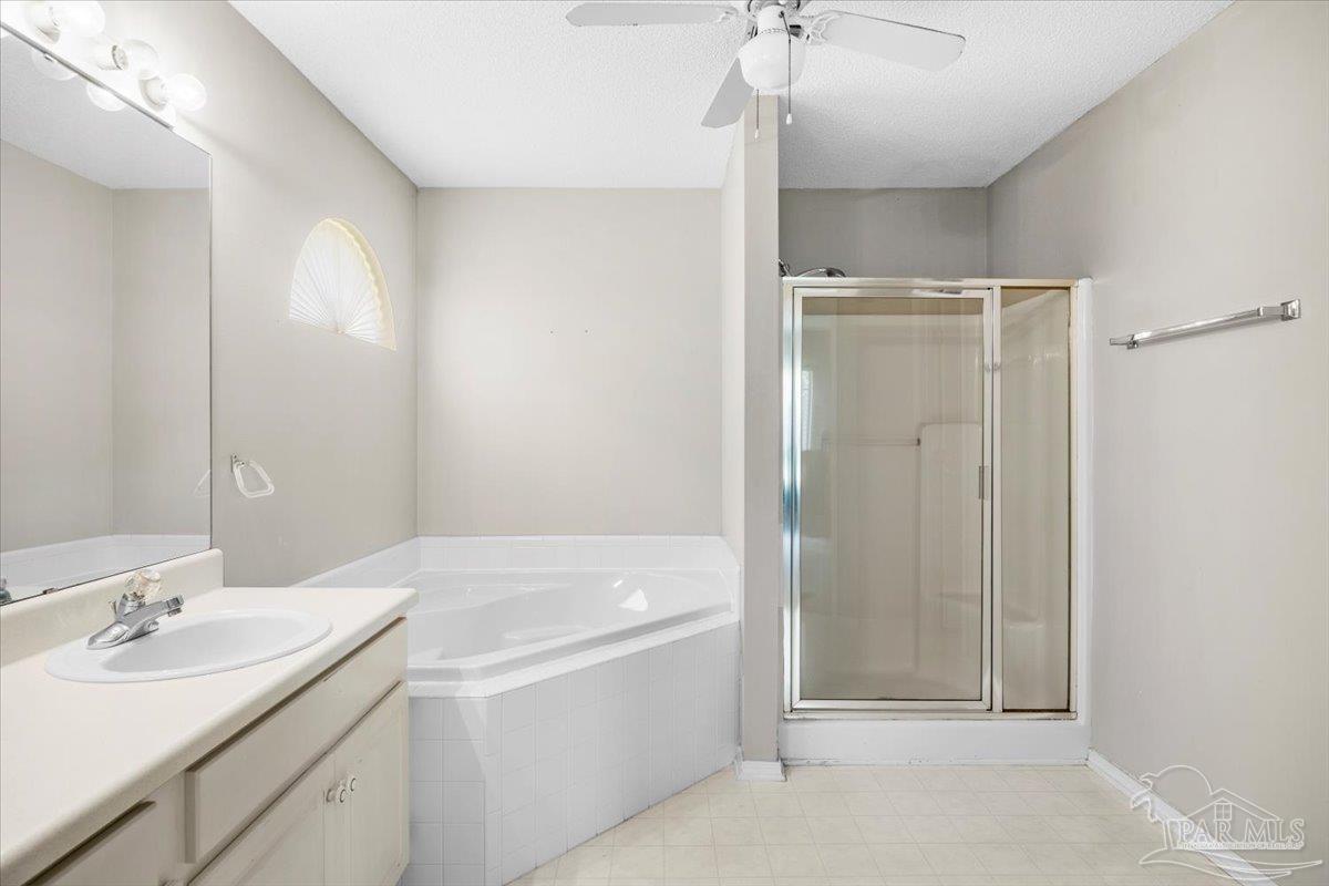 3485 Ashmore Lane Pace, FL 32571 - Photo 34 of 49 a bathroom with a bathtub and a sink