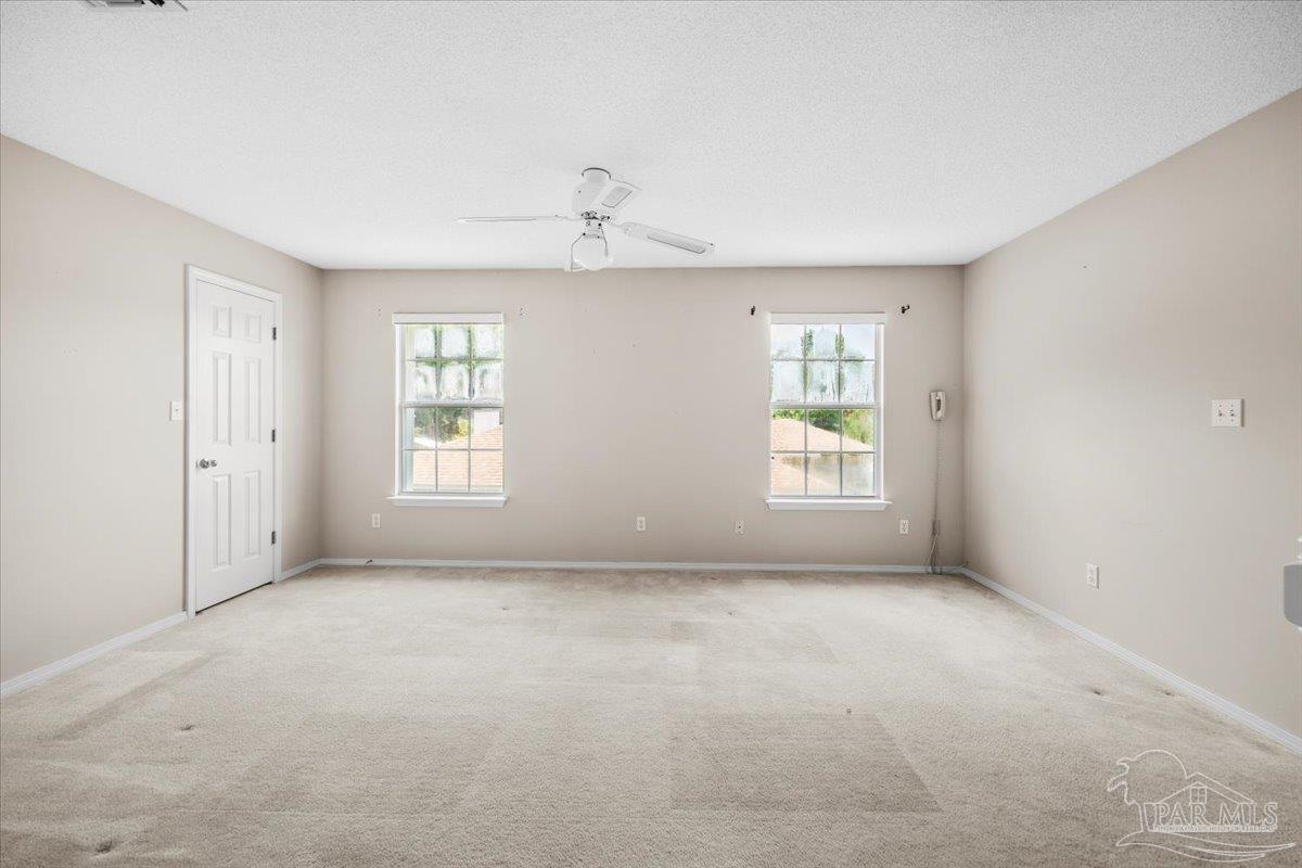 3485 Ashmore Lane Pace, FL 32571 - Photo 38 of 49 a view of an empty room with a window