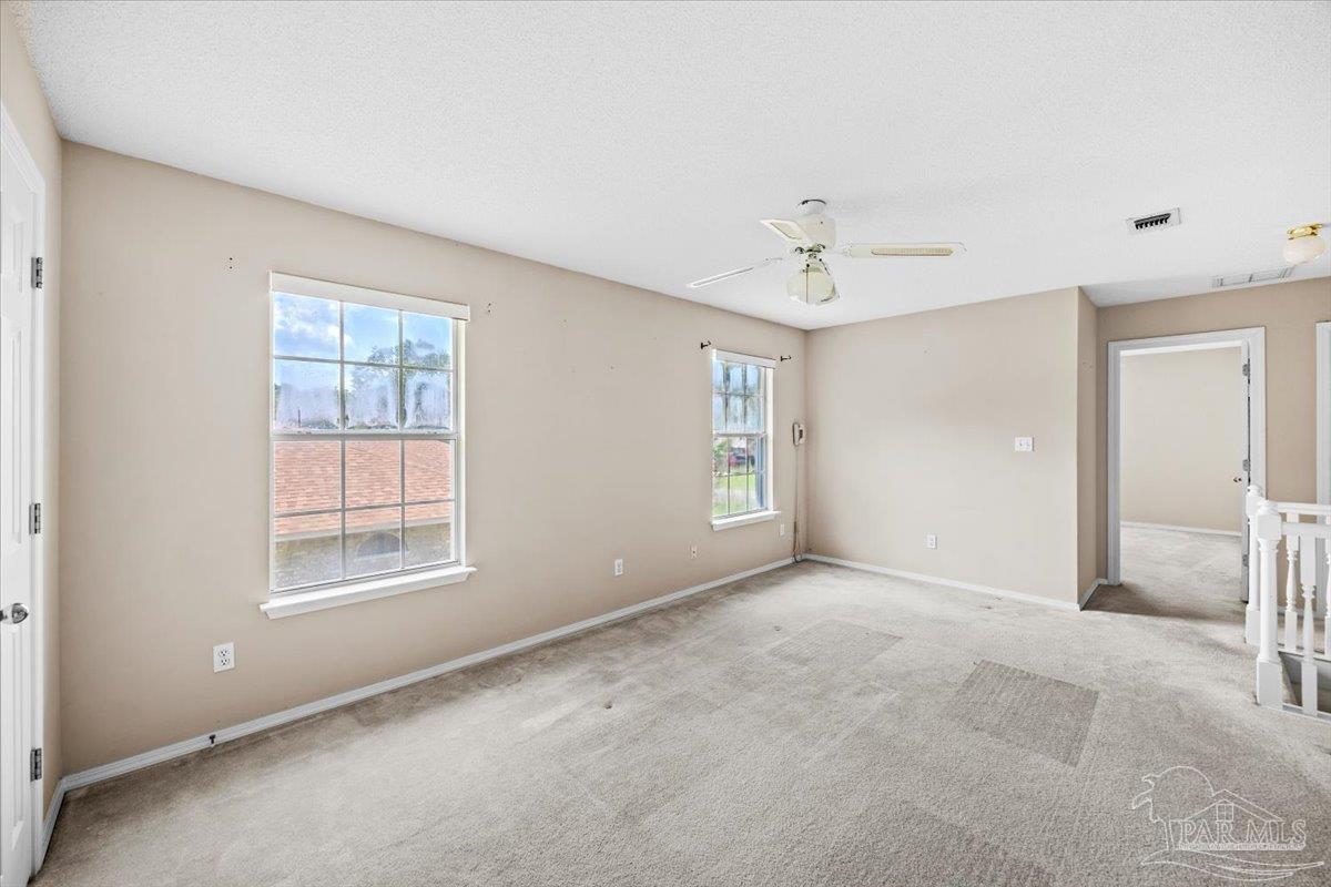 3485 Ashmore Lane Pace, FL 32571 - Photo 41 of 49 a view of an empty room with a window