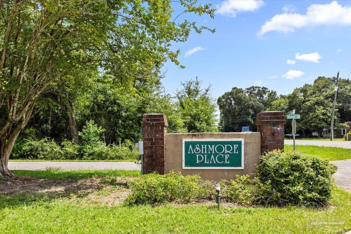 3485 Ashmore Lane Pace, FL 32571 - Photo 48 of 49 a sign on the side of the road