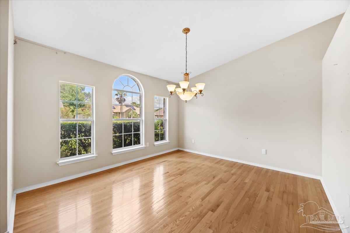 3485 Ashmore Lane Pace, FL 32571 - Photo 6 of 49 a view of an empty room with a window