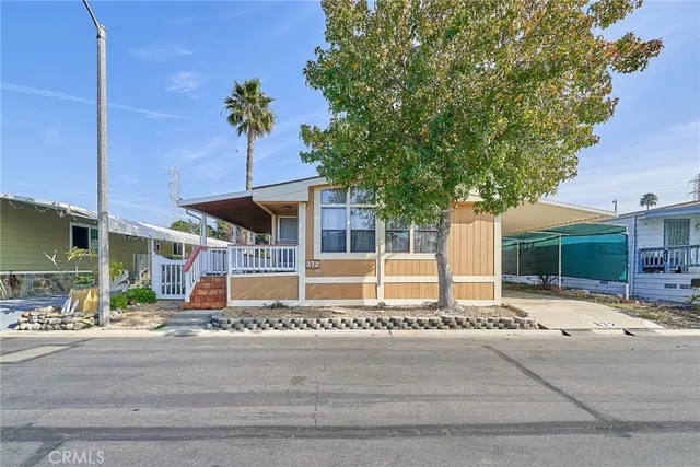 a house with a bench in front of it