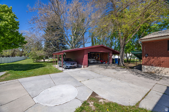 667 North 100 East Logan, UT 84321 - Photo 6 of 41 Detached Garage with a carport.