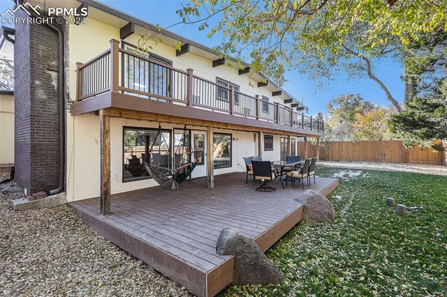 a view of a building with a sitting area
